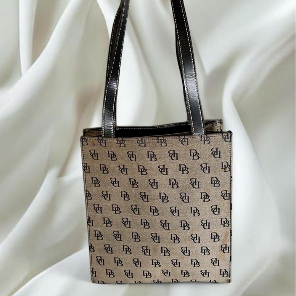Dooney & Bourke brown monogram canvas tote bag dark leather straps